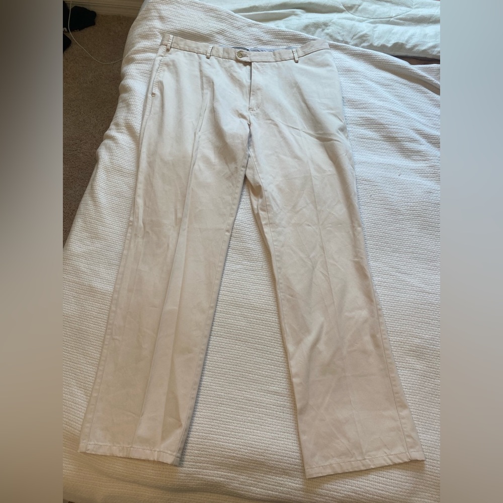 Calvin Klein tan khakis.